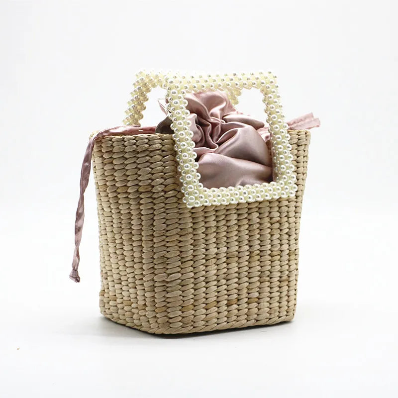 Pearl straw bag bursting with bushel woven bags holiday beach handbag