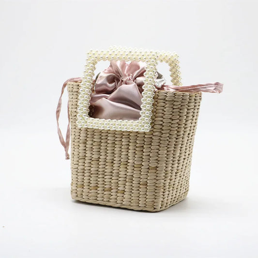 Pearl straw bag bursting with bushel woven bags holiday beach handbag