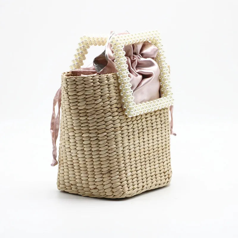 Pearl straw bag bursting with bushel woven bags holiday beach handbag